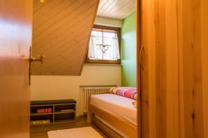 Postel nebo postele na pokoji v ubytování Ferienwohnungen Müller