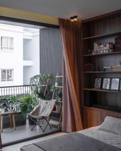 Кровать или кровати в номере Owl's Night Homestay - Keo House