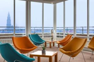 Posezení v ubytování NH Groningen Hotel