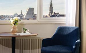 Posezení v ubytování NH Groningen Hotel