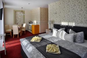 Postel nebo postele na pokoji v ubytování Dampfschiffhotel