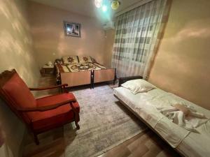 Postel nebo postele na pokoji v ubytování Prizren Home + 1 fotografie