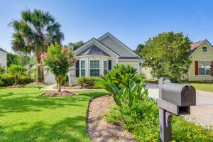 a house with a mailbox in front of a yard at Bluffton Getaway with Fenced Yard 7 Mi to Beach! in Bluffton