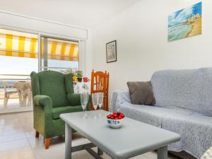 a living room with a couch and two chairs and a table at Apartment Bahia by Interhome in Cunit