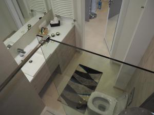 Kúpeľňa v ubytovaní Apartament Kapelanów
