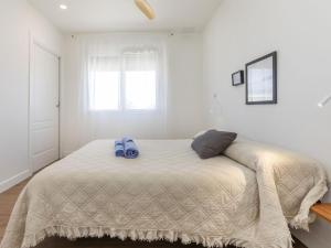 En eller flere senge i et værelse på Villa Les Oliveres by Interhome