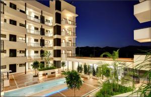 Bazén v ubytování Stunning beachfront penthouse nebo v jeho okolí