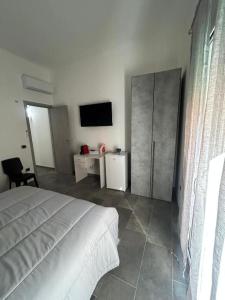 Letto o letti in una camera di Punta mare