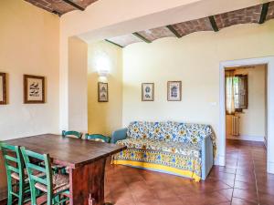 a living room with a couch and a table at Apartment Bomba vista lago 7 by Interhome in Villa Santa Maria