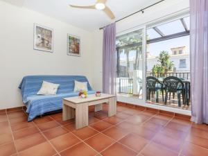 Katil atau katil-katil dalam bilik di Holiday Home Palm Beach by Interhome