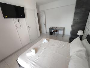 Postel nebo postele na pokoji v ubytování Guest house Sinisi