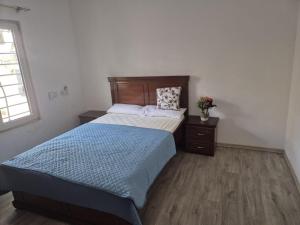 Postel nebo postele na pokoji v ubytování Saims Home