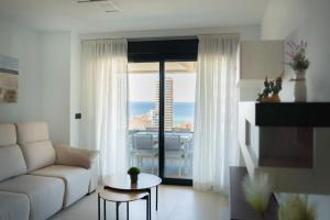 Posedenie v ubytovaní Apartamento de 3 dormitorios, piscina y parking