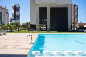 Bazén v ubytovaní Apartamento de 3 dormitorios, piscina y parking alebo v jeho blízkosti