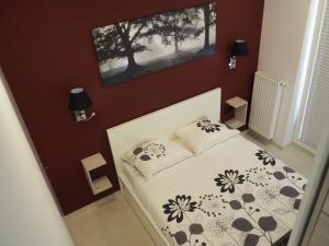 Posteľ alebo postele v izbe v ubytovaní Apartament Kapelanów