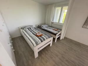 Postel nebo postele na pokoji v ubytování Seeblick-Urlaub am Bodensee