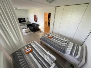 Postel nebo postele na pokoji v ubytování Seeblick-Urlaub am Bodensee