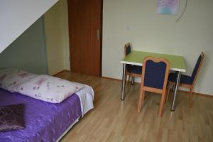 Postel nebo postele na pokoji v ubytování Apartments Jana