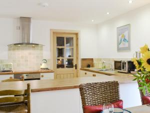 Kuchyň nebo kuchyňský kout v ubytování Paterson Cottage + 10 fotografií