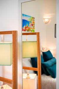 Postel nebo postele na pokoji v ubytování Breathtaking Room in Heart of Positano with Stunning Sea Views