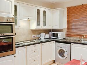 Η κουζίνα ή μικρή κουζίνα στο The Cottage