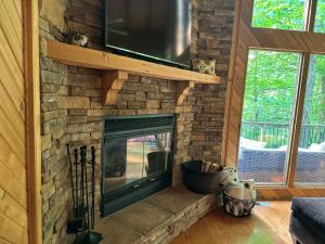 TV a/nebo společenská místnost v ubytování Sunflower Valley