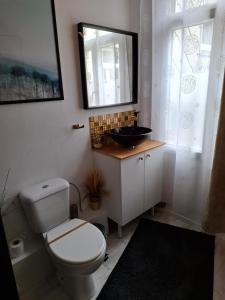 Baðherbergi á Room De Lux SPA " TABARKA "