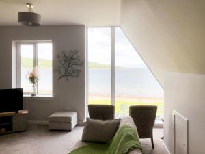 พื้นที่นั่งเล่นของ Gleaner Lea Apartment