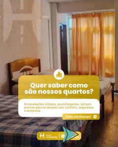 a hotel room with a sign that says uber sleepernerneraho also mosos at HOTEL LIVRAMENTO Maceió in Maceió