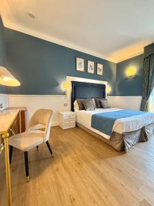 Postel nebo postele na pokoji v ubytování Hotel Goya