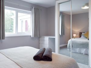 Ένα ή περισσότερα κρεβάτια σε δωμάτιο στο Oak Cottage - Uk11212