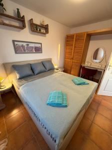 Postel nebo postele na pokoji v ubytování Apartmán Pipi Holiday Village 8A + 3 fotografie