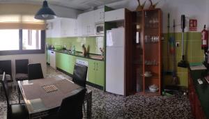 Kuchyňa alebo kuchynka v ubytovaní Ca Sanchis, piso en el casco antiguo