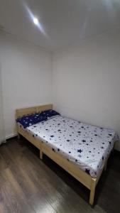 Postel nebo postele na pokoji v ubytování Dominic House