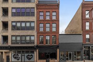 a row of brick buildings on a city street at Old City-New Building Charm-Walk to Everything! in Philadelphia
