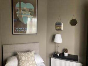 Postel nebo postele na pokoji v ubytování Ballybur Lodge