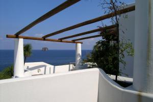 a view of the ocean from the balcony of a house at La Sirenetta Park Hotel in Stromboli