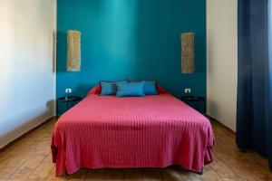 Ένα ή περισσότερα κρεβάτια σε δωμάτιο στο residenza LA NOA