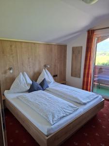 Postel nebo postele na pokoji v ubytování Appartement Etschbacher