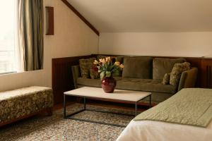 Posezení v ubytování Le Cedrus Hotel