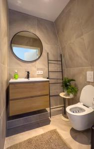 Ένα μπάνιο στο Vakantieappartement Oostkapelle +28 φωτογραφίες