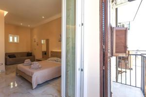 Un pat sau paturi într-o cameră la Room - Vista Mare