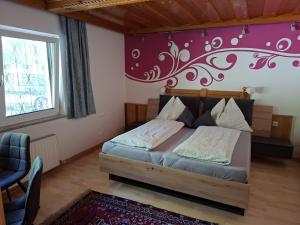 Postel nebo postele na pokoji v ubytování Appartement Etschbacher