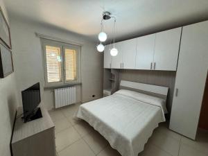 Postel nebo postele na pokoji v ubytování Il Belvedere Guest House