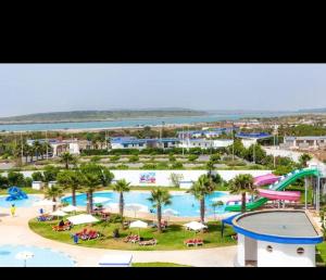 a pool at a resort with a water park at Mehdia beach in Kenitra