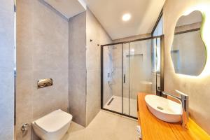 Koupelna v ubytování Lyxos Hotel