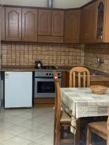 Kuchyň nebo kuchyňský kout v ubytování Relax Apartment & Hotel