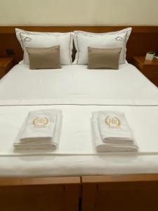 Postel nebo postele na pokoji v ubytování Relax Apartment & Hotel