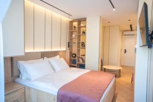 Postel nebo postele na pokoji v ubytování Guesthouse Sidro
