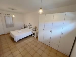 Ein Bett oder Betten in einem Zimmer der Unterkunft Anahi Homes Corralejo - Villa Dracaena 2